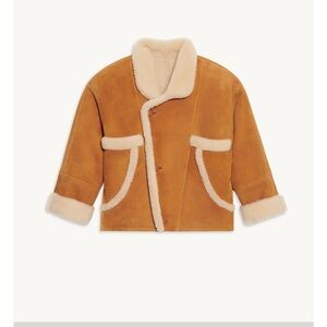 Brand new with tags! Short sheepskin coat from Sandro. Never been used. Size L.